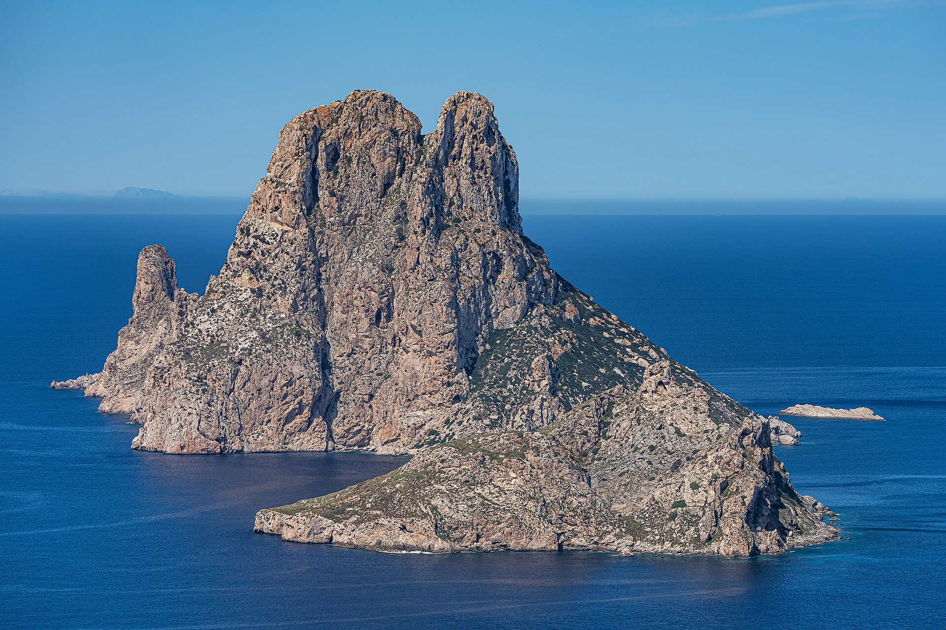 Es Vedrà sea stack rising from the turquoise Mediterranean off Ibiza